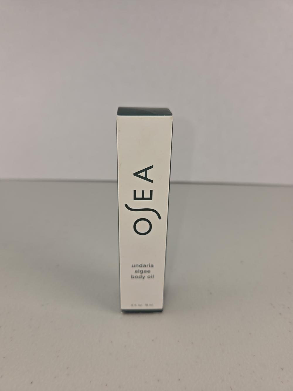 OSEA Undaria Algae Body Oil โ .6 Fl Oz White with Dark Teal Accents